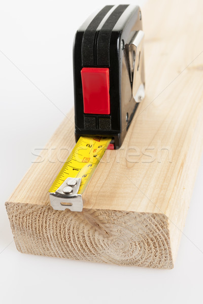 Stock photo: Tape measure on wood