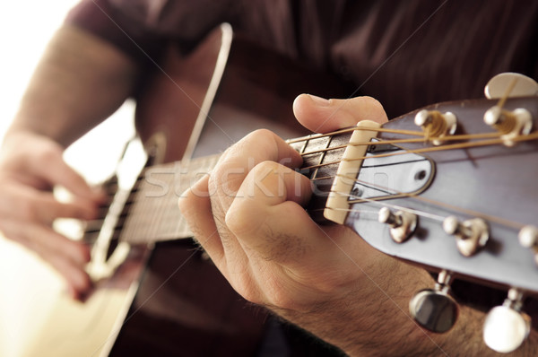 Man playing a guitar Stock photo © elenaphoto