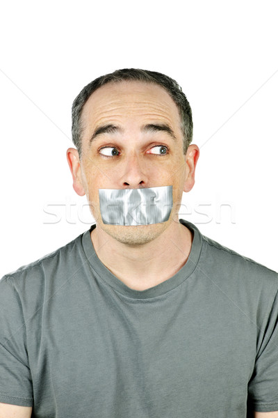 Man with duct tape on mouth Stock photo © elenaphoto