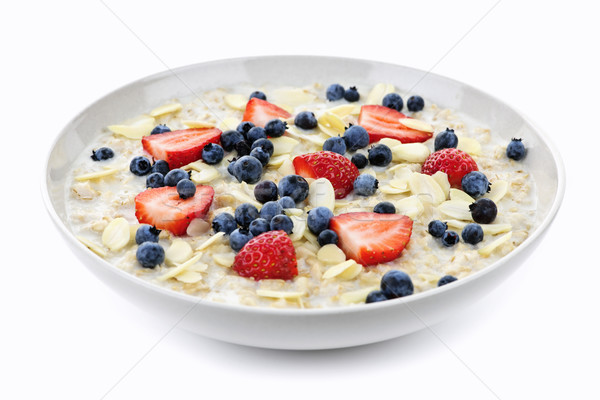 Bowl of oatmeal with berries Stock photo © elenaphoto