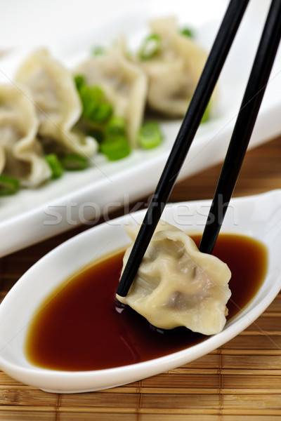 Steamed dumplings and soy sauce Stock photo © elenaphoto