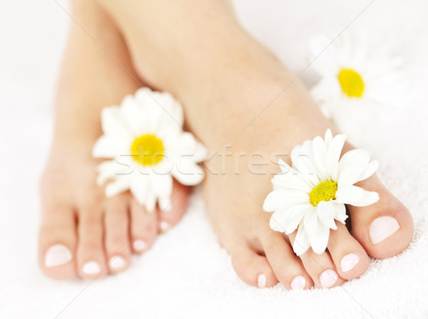 Femenino pies pedicure suave flores Foto stock © elenaphoto