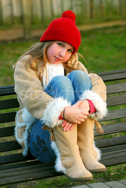 Girl on bench Stock photo © elenaphoto