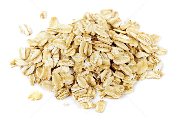 Pile of uncooked rolled oats Stock photo © elenaphoto