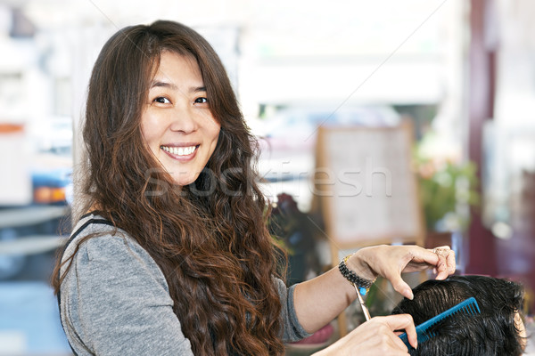 Hairstylist working Stock photo © elenaphoto