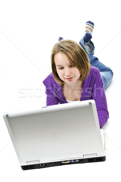 Lány számítógép fiatal lány fekszik laptop számítógép gyerekek Stock fotó © elenaphoto