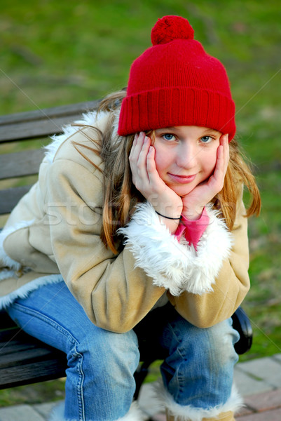 Lány pad portré fiatal lány ül kezek Stock fotó © elenaphoto