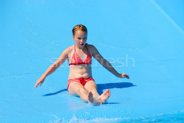 Girl water slide Stock photo © elenaphoto