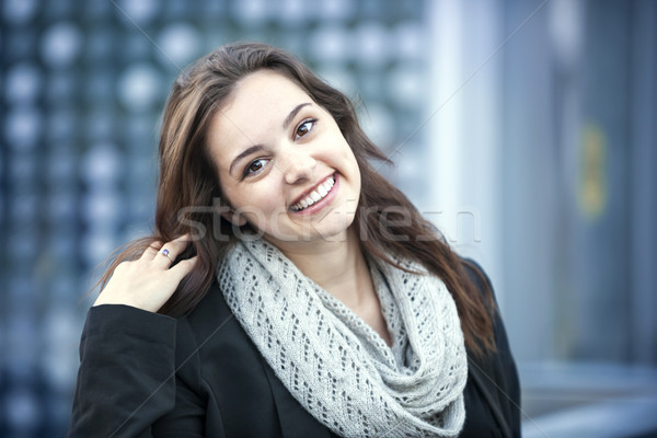 Smiling brunette woman Stock photo © elenaphoto