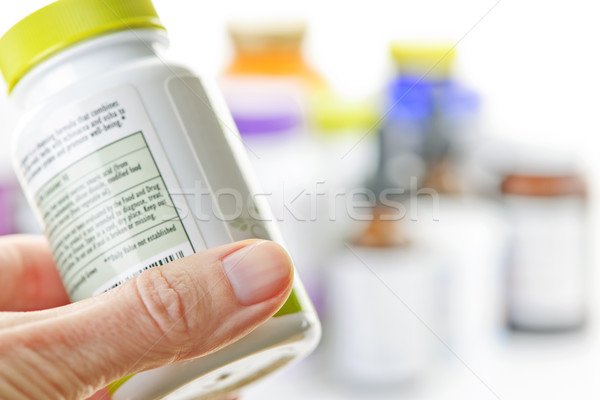 Stock foto: Hand · halten · lesen · Label · Medizin