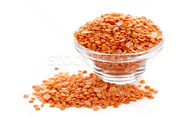 Bowl of uncooked red lentils Stock photo © elenaphoto