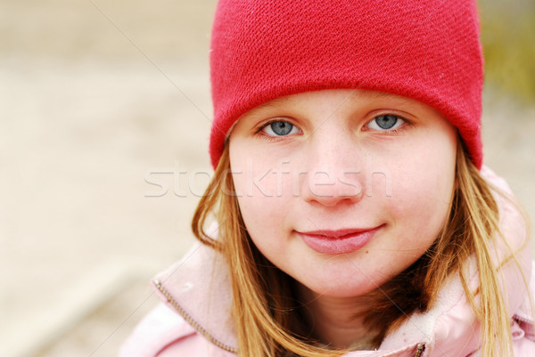 Girl in a red hat Stock photo © elenaphoto