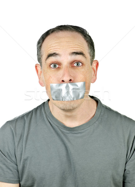 Man with duct tape on mouth Stock photo © elenaphoto