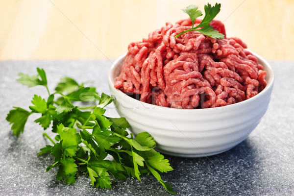 Bowl of raw ground meat Stock photo © elenaphoto