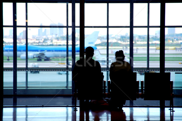 Stockfoto: Paar · luchthaven · wachten · internationale · vrouw · vliegtuig