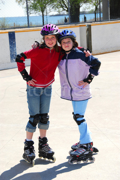 Two girls rollerblading Stock photo © elenaphoto