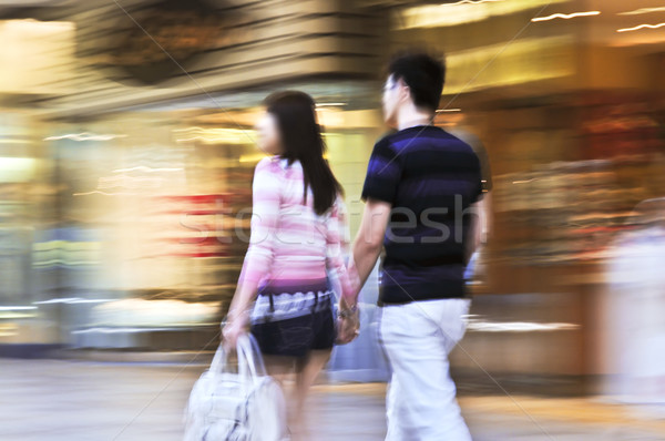 Einkaufszentrum Paar erschossen Bewegungsunschärfe Frau Mode Stock foto © elenaphoto