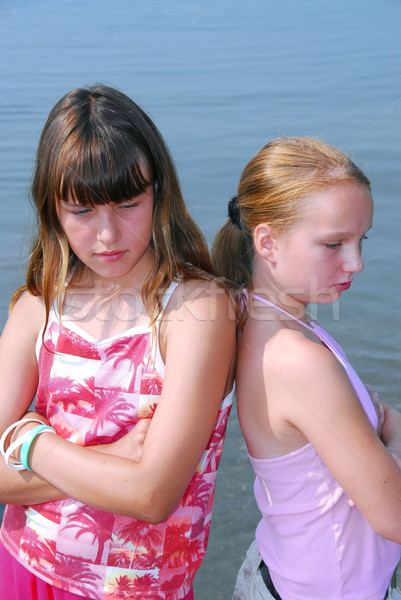 Stock photo: Two girls pouting