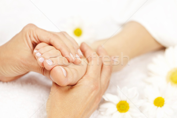 Foot massage Stock photo © elenaphoto