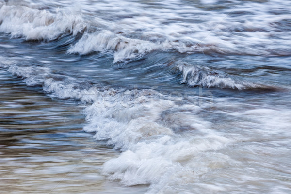 Hullámok part kék habos óceán sekély Stock fotó © elenaphoto