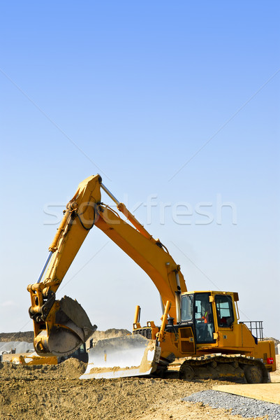 Bouwplaats Geel bulldozer bewegende aarde Stockfoto © elenaphoto