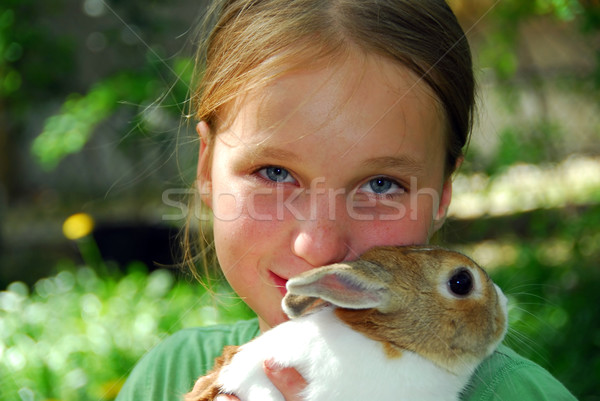 Girl and bunny Stock photo © elenaphoto