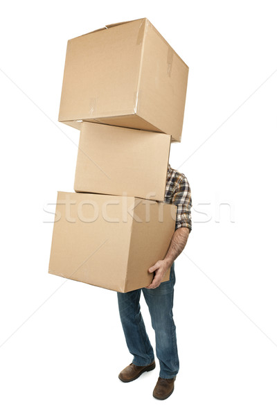 Man carrying stack of cardboard boxes Stock photo © elenaphoto