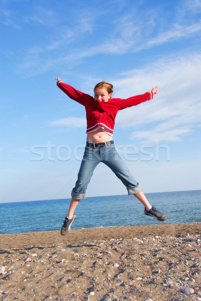 Girl child jumping Stock photo © elenaphoto