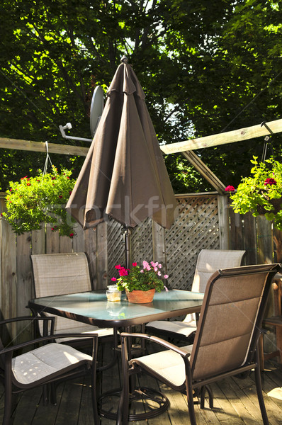 Patio furniture on a deck Stock photo © elenaphoto