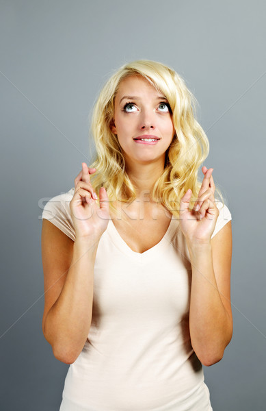 надеющийся женщину пальцы блондинка кавказский лице Сток-фото © elenaphoto
