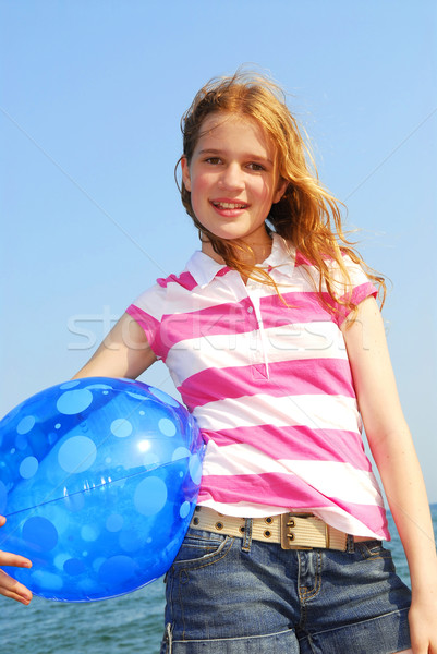 Young girl with beach ball Stock photo © elenaphoto
