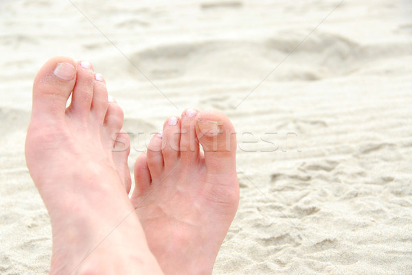 Sandy feet Stock photo © elenaphoto