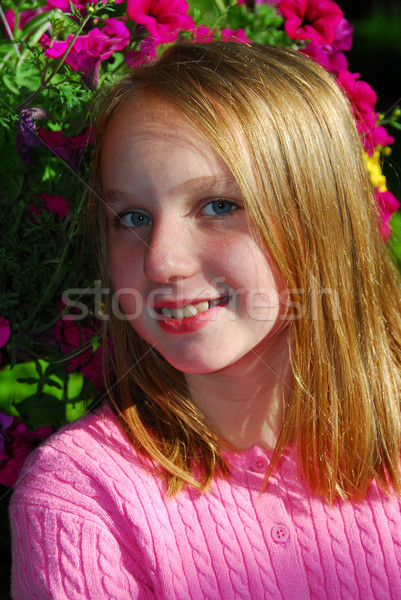 Young girl with flowers, portrait Stock photo © elenaphoto