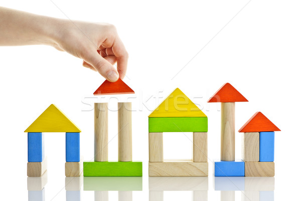 Gebouw hand huizen houten speelgoed Stockfoto © elenaphoto