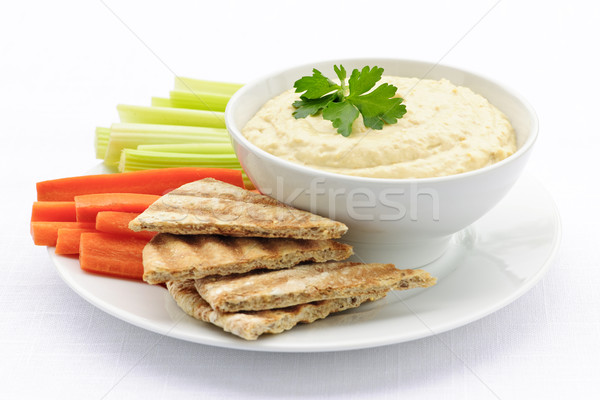 Hummus with pita bread and vegetables Stock photo © elenaphoto