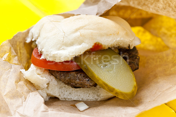 Hamburger with pickle and tomato Stock photo © elenaphoto