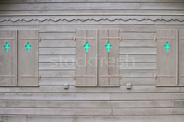 Barna zsalu zárva három fából készült ház Stock fotó © Elenarts