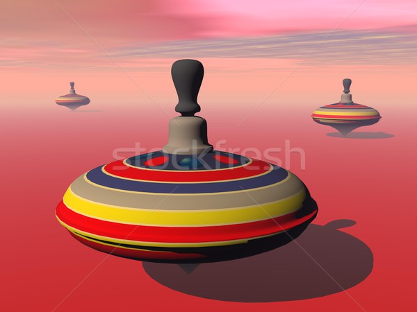 Spinning tops - 3D render Stock photo © Elenarts