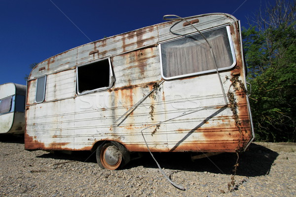 Dusty abandonned old caravan Stock photo © Elenarts