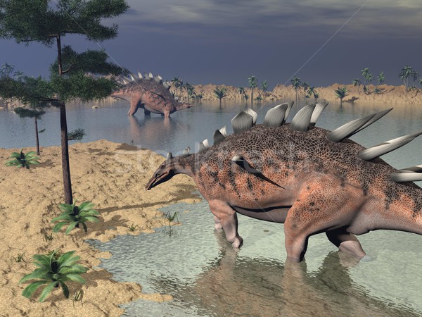 Stock photo: Kentrosaurus dinosaurs in the desert - 3D render