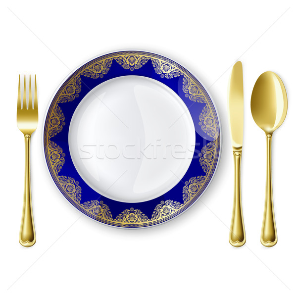 Plate with spoon, knife and fork Stock photo © ElenaShow