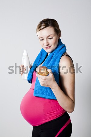 Сток-фото: беременная · женщина · осуществлять · мяча · красный · груди
