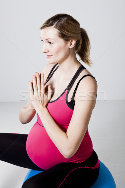 Stock fotó: Terhes · nő · meditál · kezek · együtt · ül · fitnessz