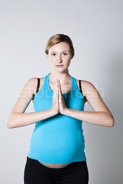 Femme enceinte méditer mains ensemble femme fitness [[stock_photo]] © ElinaManninen