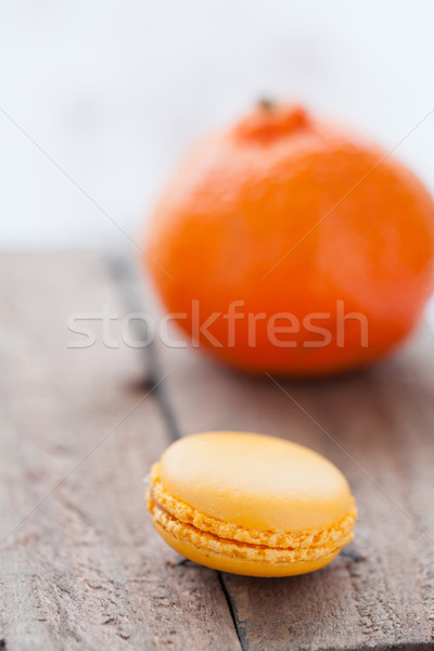 Macaroon and orange Stock photo © ElinaManninen