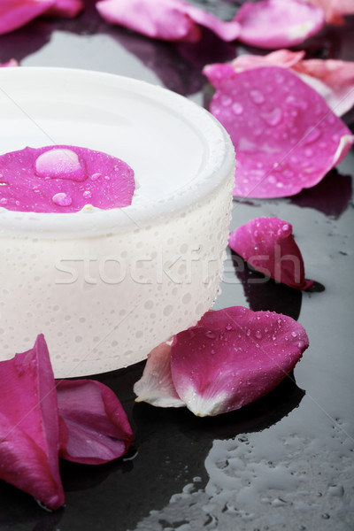 Pink flower petal and water bowl decoration. Stock photo © ElinaManninen