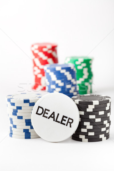Poker chips and dealer button Stock photo © ElinaManninen