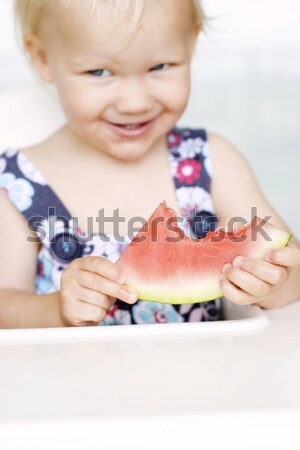 Stock photo: Cute little girl and her breakfast porridge bowl.