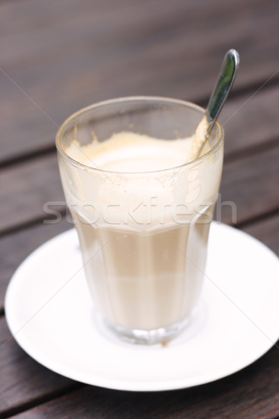 Half empty latte in a glass on a caf Stock photo © ElinaManninen
