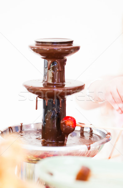 Chocolate fondue fountain Stock photo © ElinaManninen